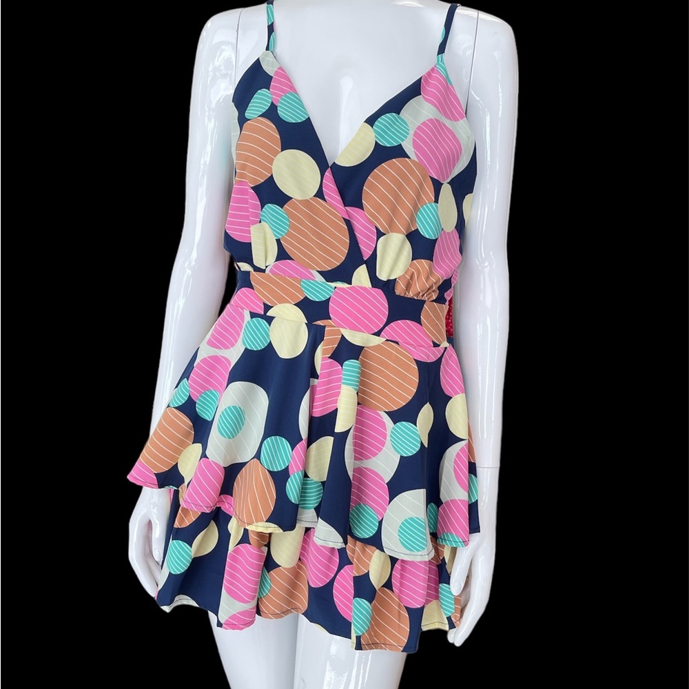 Brand new romper, size 4